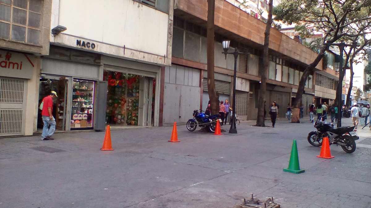 comerciantes reducen personal