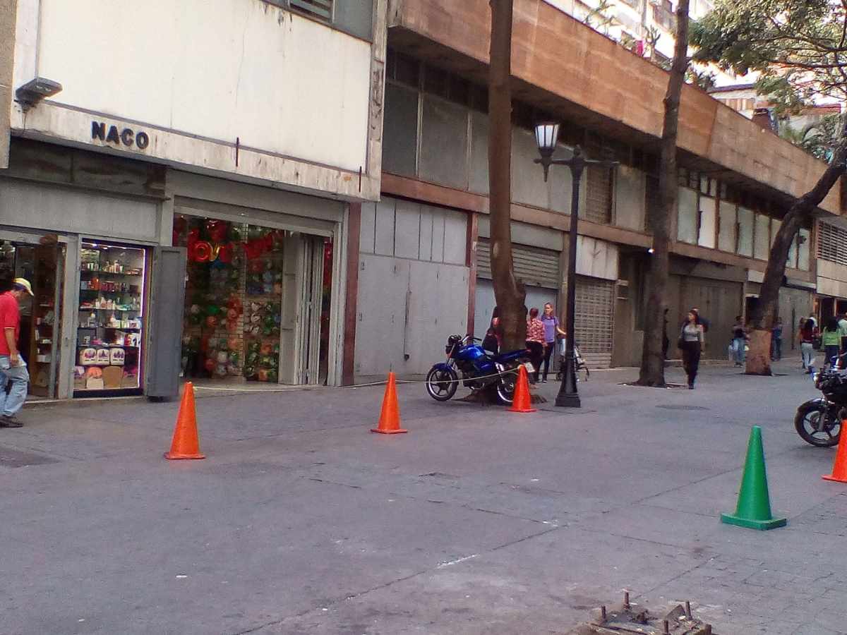 comerciantes reducen personal