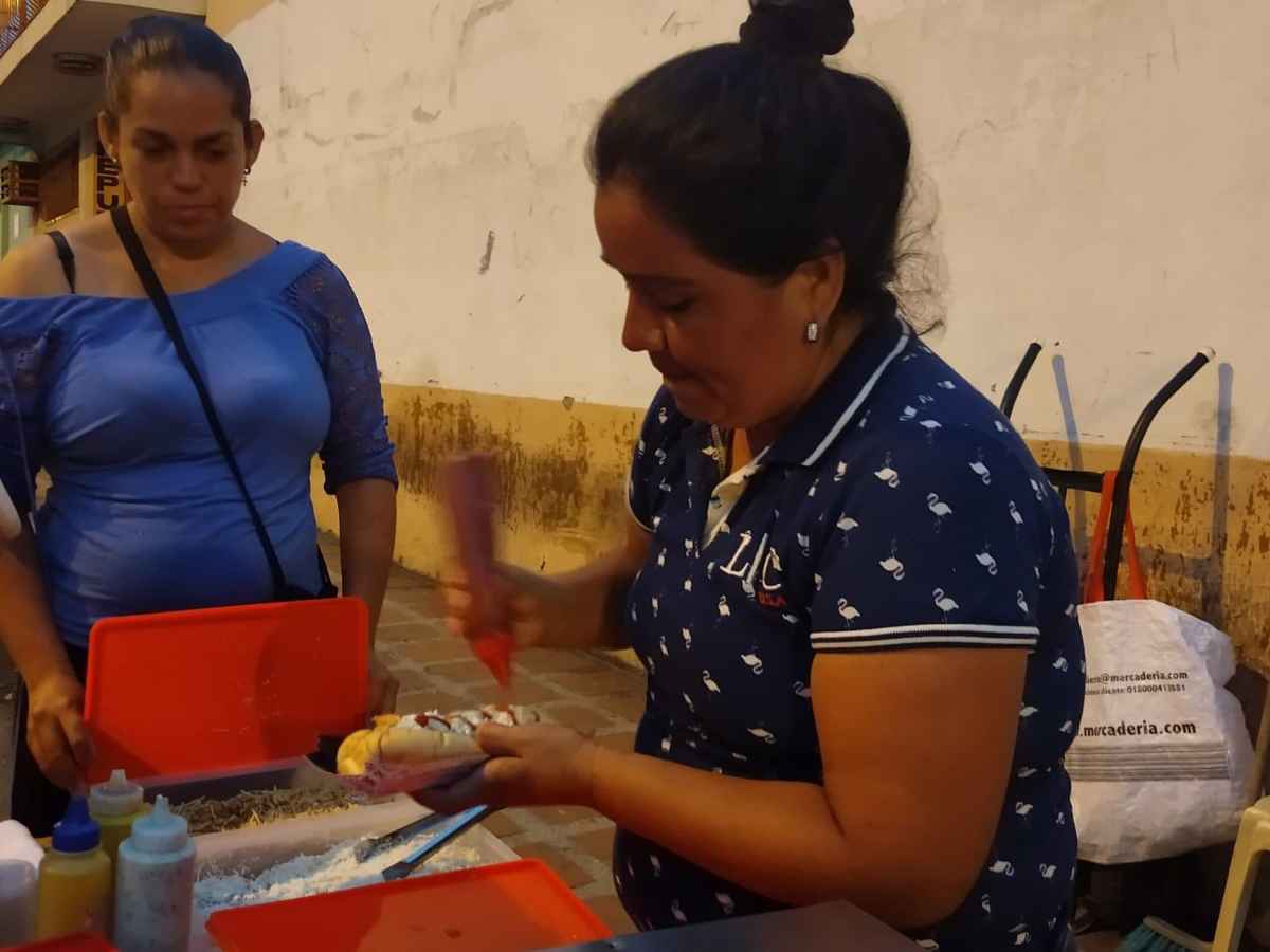 Vendedores de perros calientes